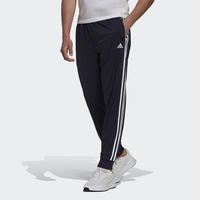 Essentials Warm-Up Tapered 3-Stripes Track Pants, adidas