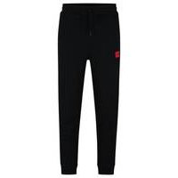 Cotton-terry tracksuit bottoms with red logo label, Hugo boss