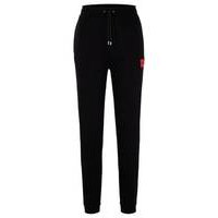Cotton-terry tracksuit bottoms with logo label, Hugo boss