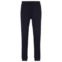 Cotton tracksuit bottoms with curved logo, Hugo boss
