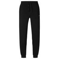 Stretch-cotton tracksuit bottoms with embroidered logo, Hugo boss