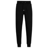 Cotton-terry tracksuit bottoms with printed logo, Hugo boss