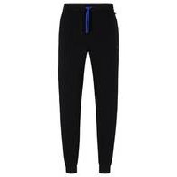 Stretch-cotton tracksuit bottoms with embroidered logo, Hugo boss