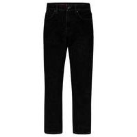 Loose-fit jeans in black flock-print denim, Hugo boss