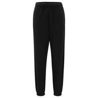 Relaxed-fit tracksuit bottoms with embossed stacked logo, Hugo boss
