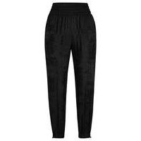 Baggy-fit trousers with metallic-effect print, Hugo boss