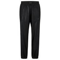 Faux-leather tracksuit bottoms with framed logo, Hugo boss