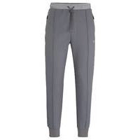 Cotton-blend tracksuit bottoms with pixelated details, Hugo boss