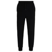 Stretch-cotton tracksuit bottoms with logo print, Hugo boss