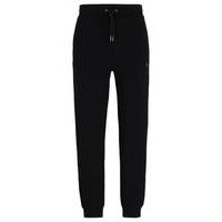Stretch-cotton tracksuit bottoms with stacked logo, Hugo boss