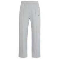 Relaxed-fit tracksuit bottoms in cotton-blend jacquard, Hugo boss